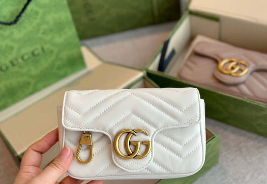 "Gucci's Opulent Elegance: White Leather Chain Shoulder Bag – A Designer Marvel for the Stylish Woman's Large-Capacity Quilted Messenger, Handbag, Purse, and Shopping Wallet."